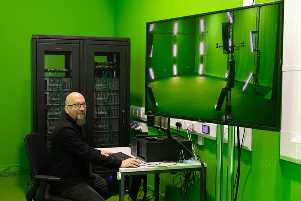 Person in front of screen